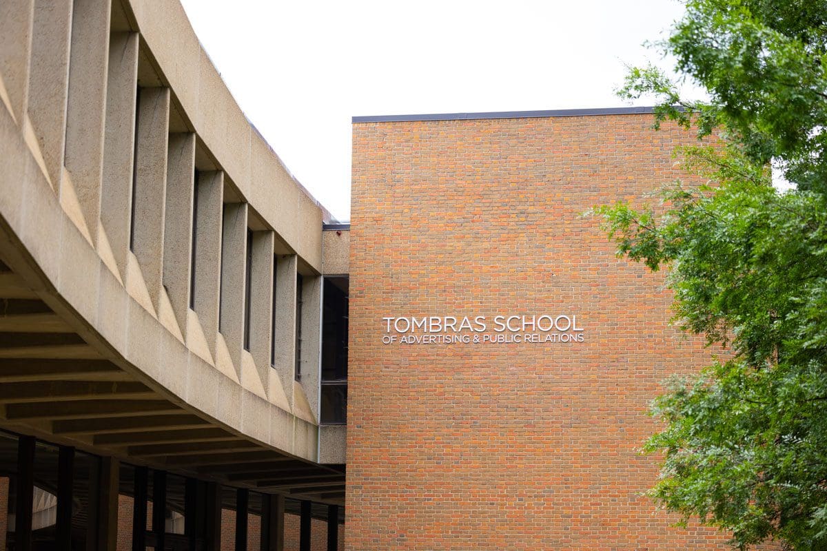 View of the Tombras School of Advertising and Public Relations lettering on the outside of the building.
