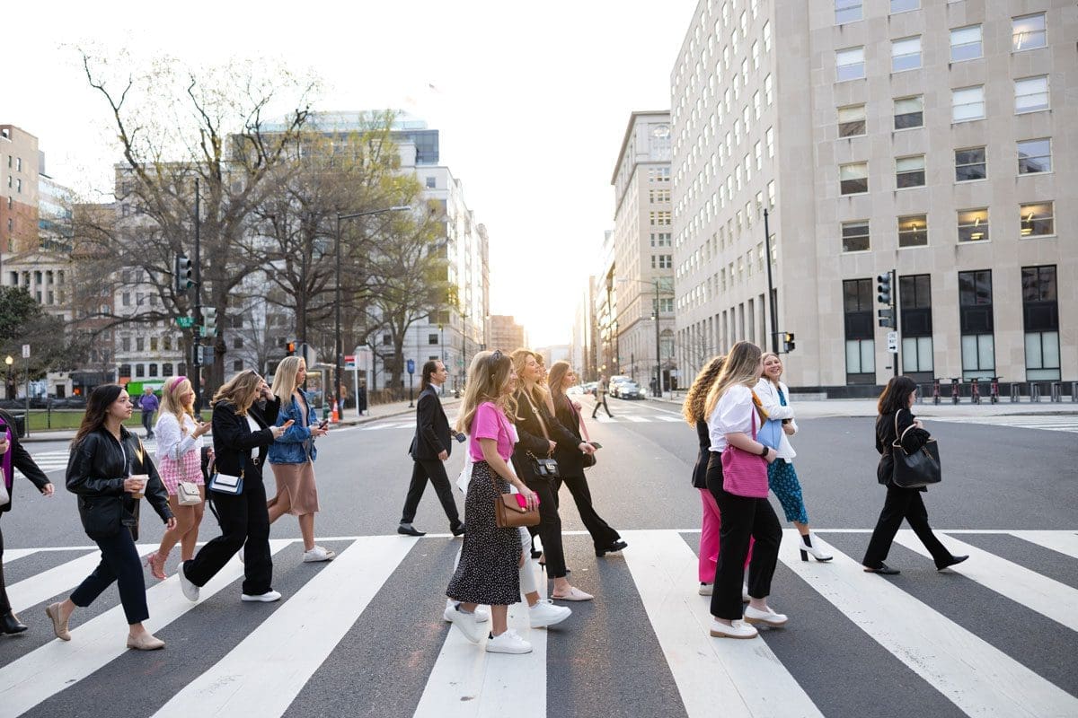ADPR students on a crosswalk during a networking trip.
